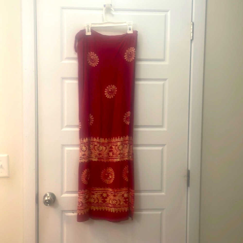 Wrap around skirt with a tie at the waist.